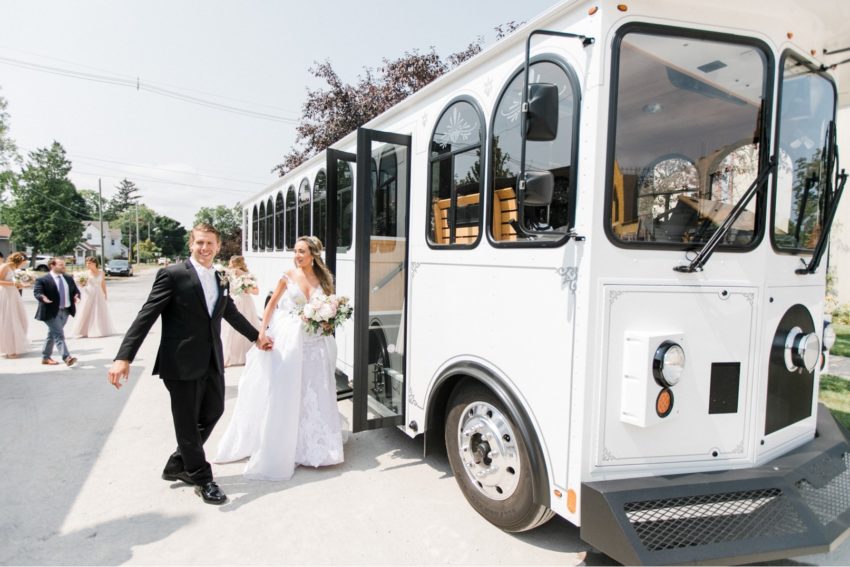 Wedding party boarding a trolley bus in Chicago